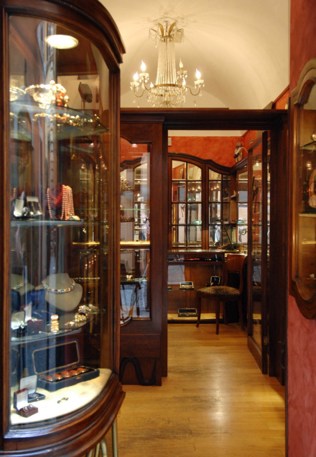 Detail of the historic walnut and brass interior of the Gisci boutique
